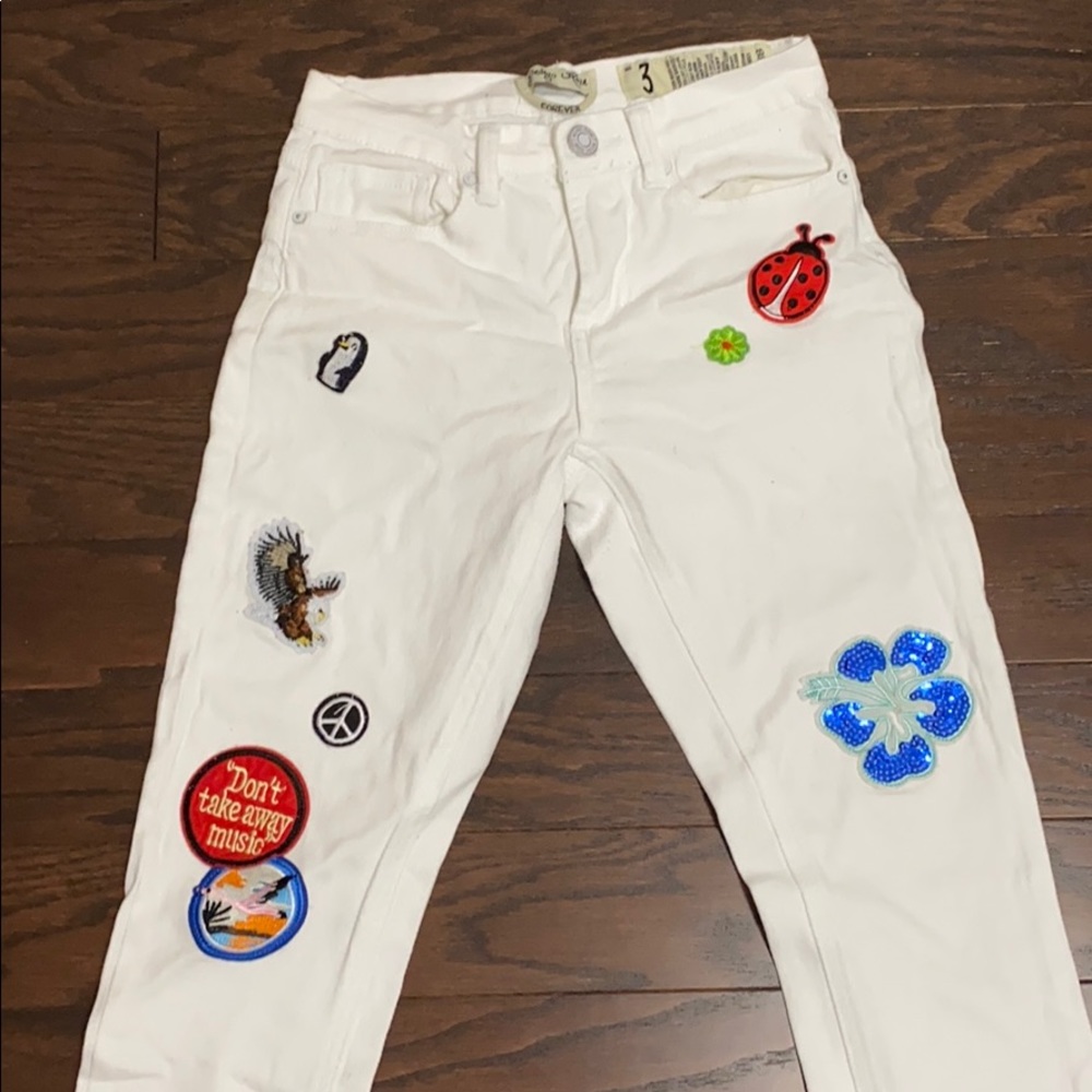 white skinny jeans with patches great condition